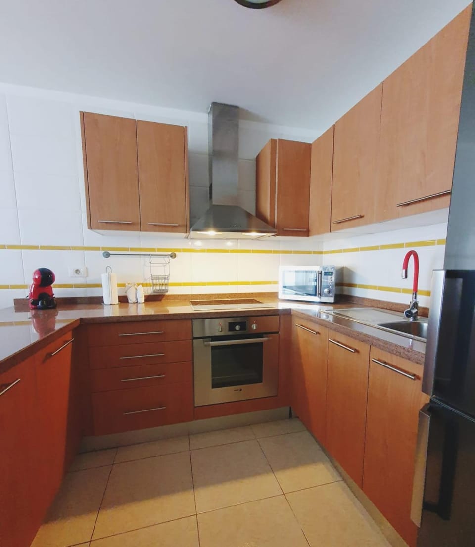 Kitchen or kitchenette, oven, stove