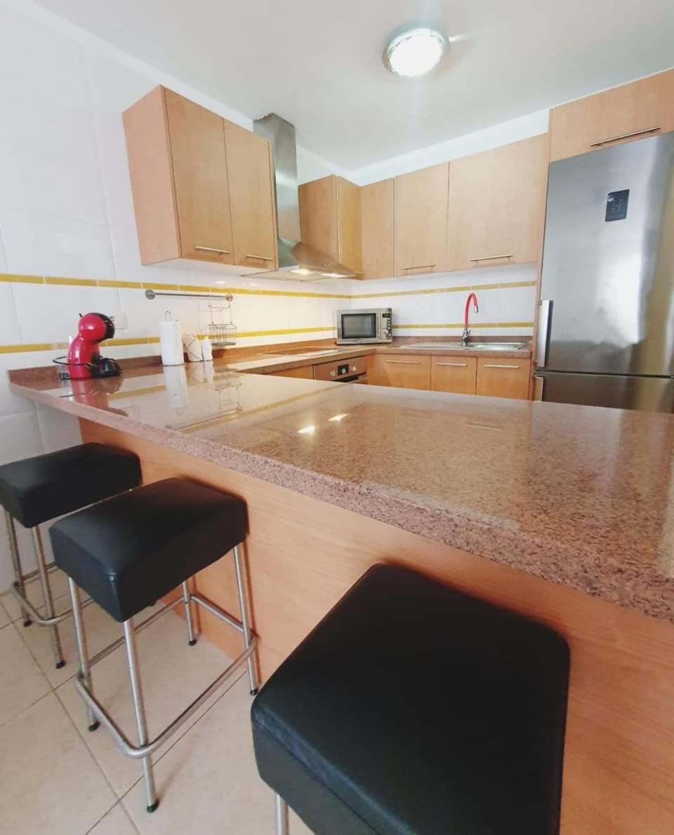 Kitchen or kitchenette, oven