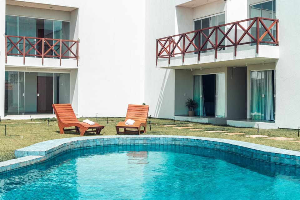 Property building, Pool view, Swimming pool, sunbed