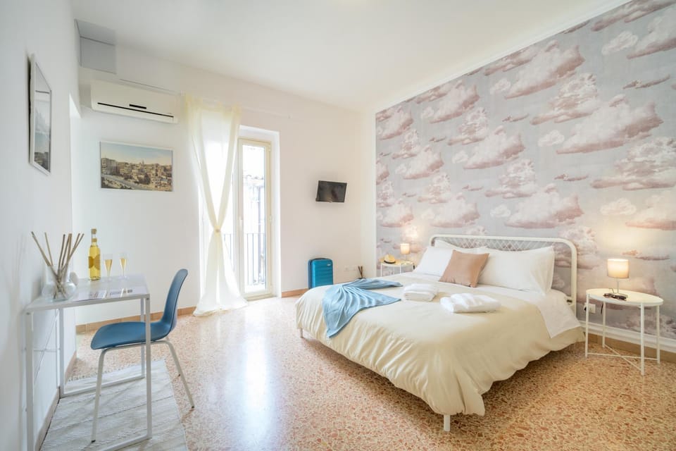 Bed, Bird's eye view, View (from property/room), Living room, Photo of the whole room, Seating area, Bedroom, City view, towels, air conditioner
