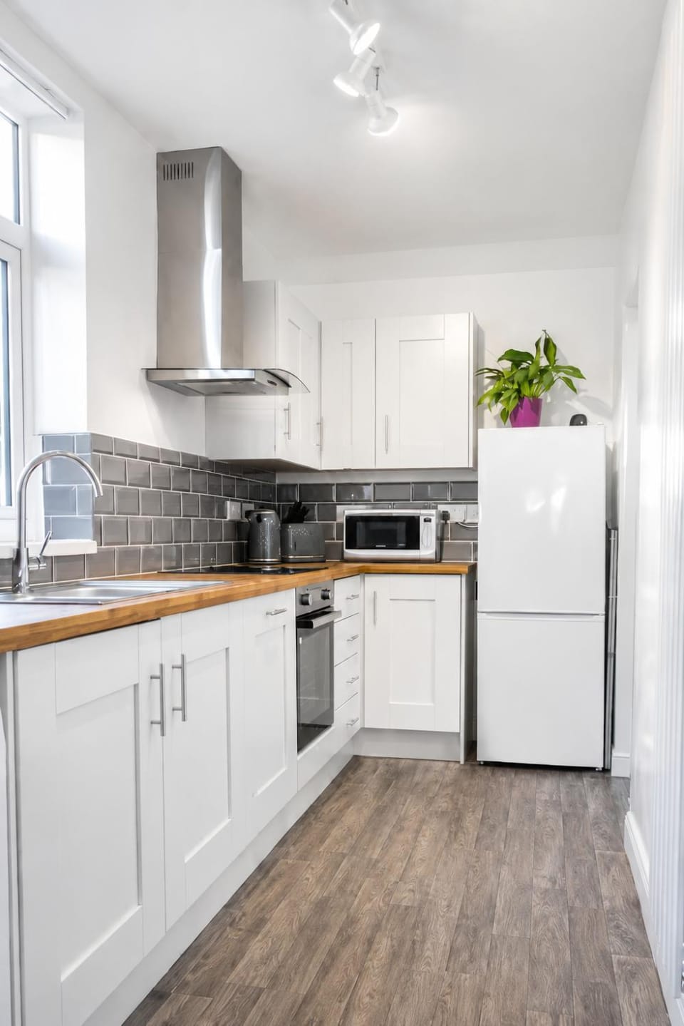 Kitchen or kitchenette, oven, stove, toaster