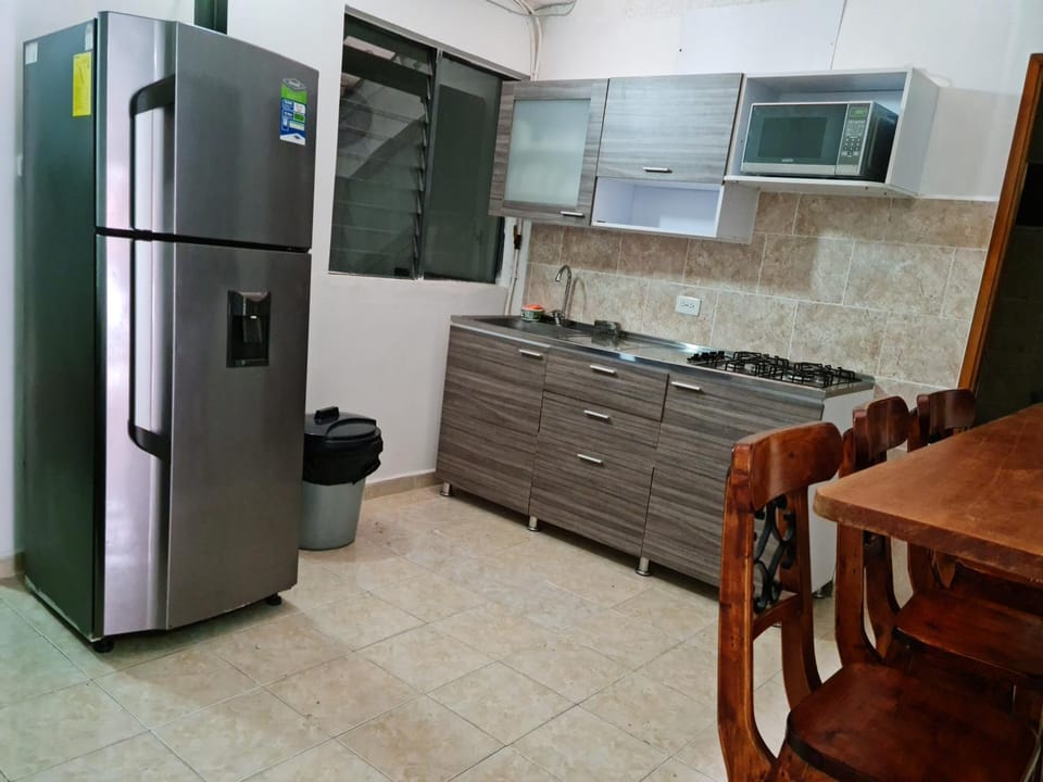 Kitchen or kitchenette, minibar, stove