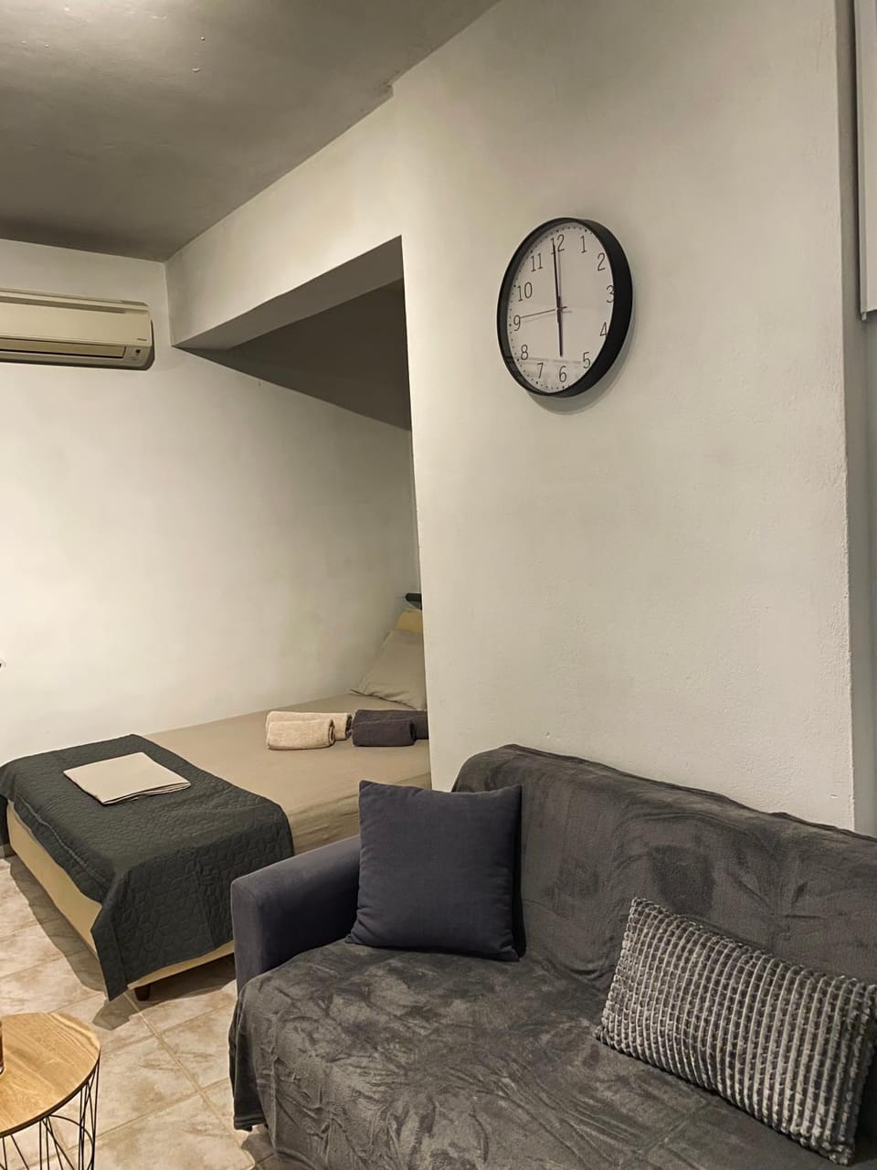 Bed, Living room, Seating area, Bedroom, air conditioner