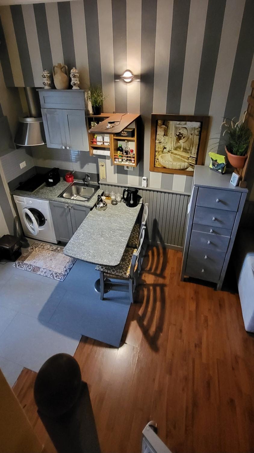 Kitchen or kitchenette, stove, washing machine