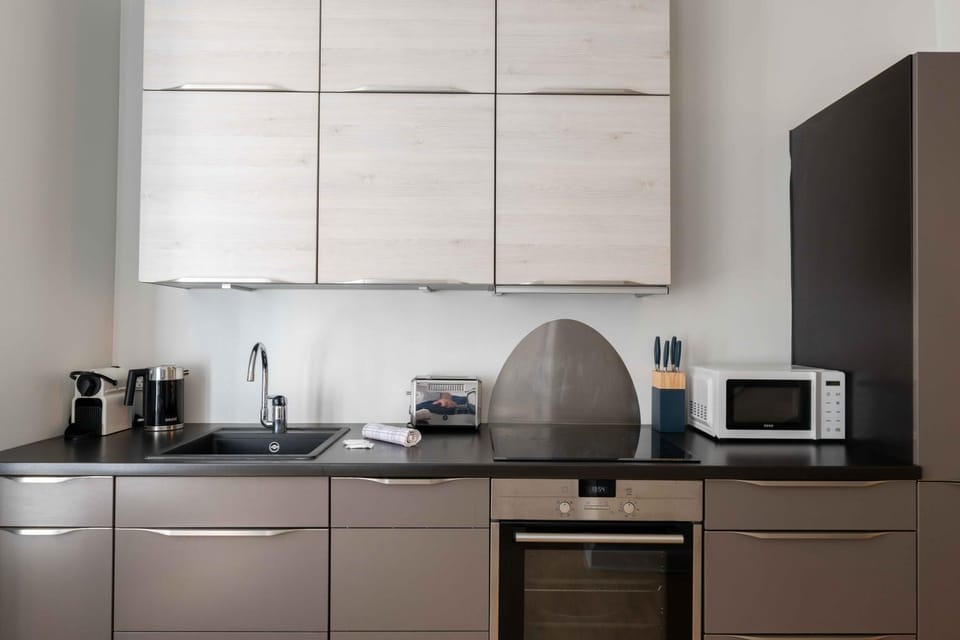 Kitchen or kitchenette, oven, stove