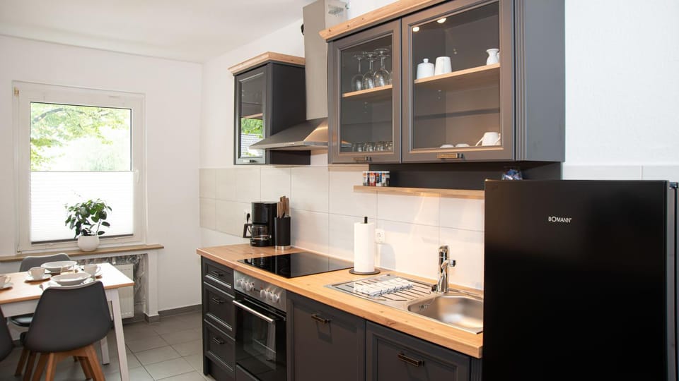 Kitchen or kitchenette, stove, kitchen