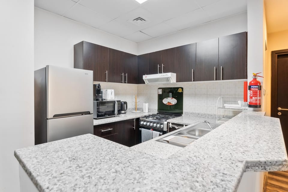 Kitchen or kitchenette, oven, stove, toaster