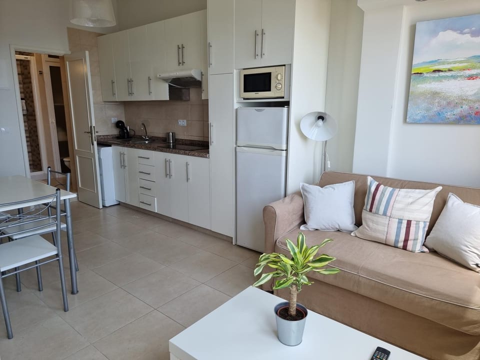 Kitchen or kitchenette, Living room, Dining area, Sea view