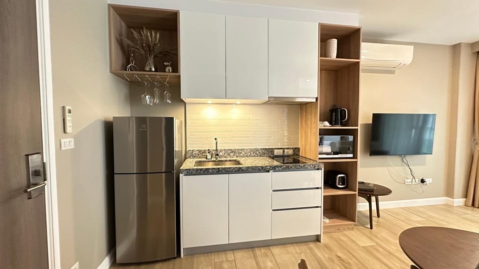 Kitchen or kitchenette, stove, toaster