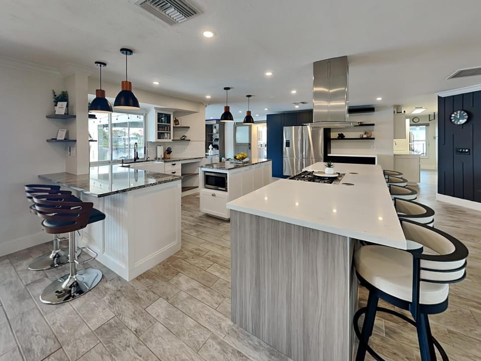 Kitchen or kitchenette, Seating area, furniture, microwave, oven, stove, kitchen