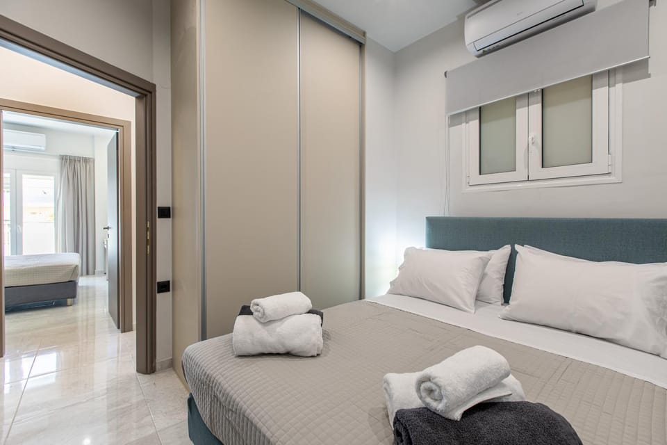Bed, Photo of the whole room, Bedroom, towels, air conditioner