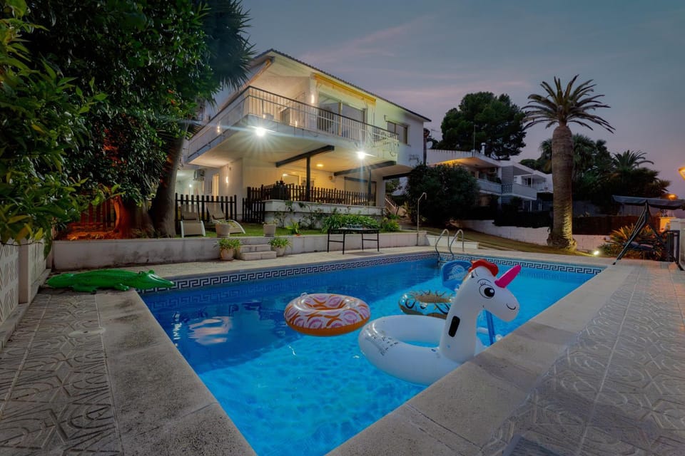 Property building, Living room, Swimming pool