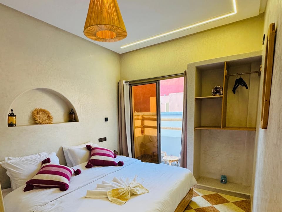 Bed, Natural landscape, Bedroom, Sea view, towels, wardrobe