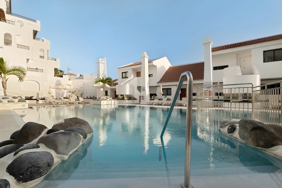 Property building, Living room, Swimming pool