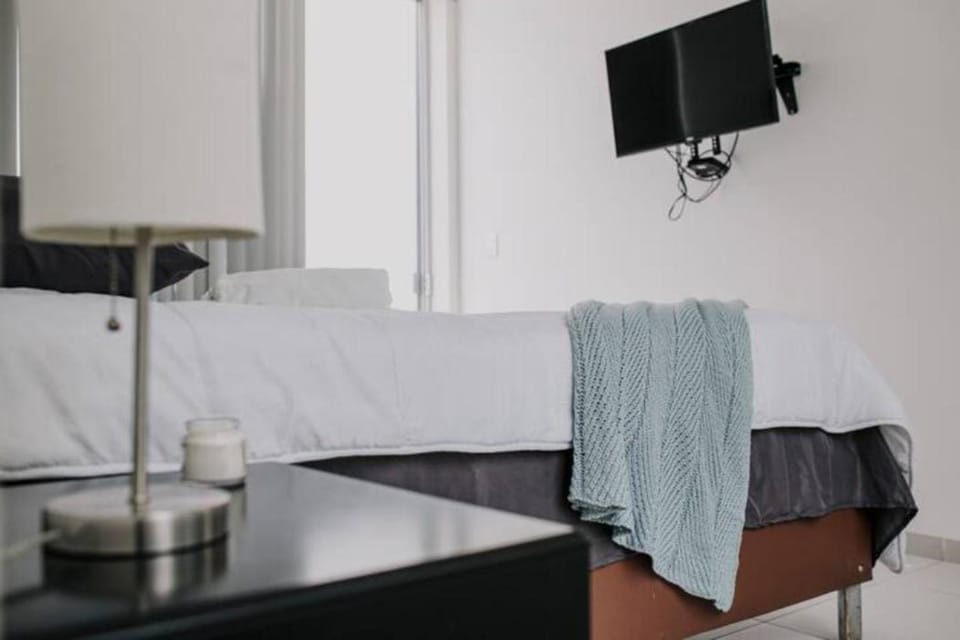 Bed, TV and multimedia, Decorative detail, Bedroom