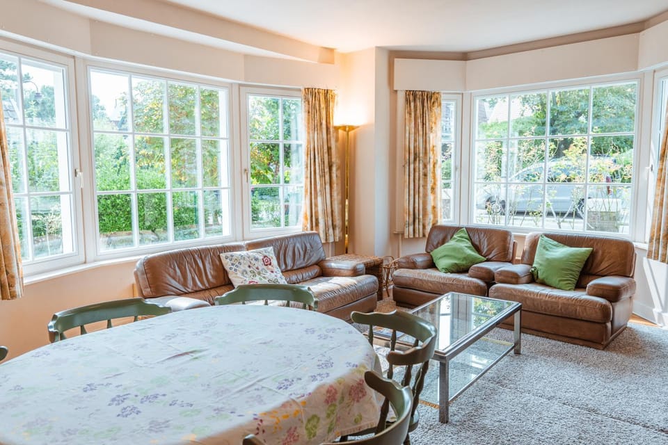 Property building, Living room, Seating area, Garden view