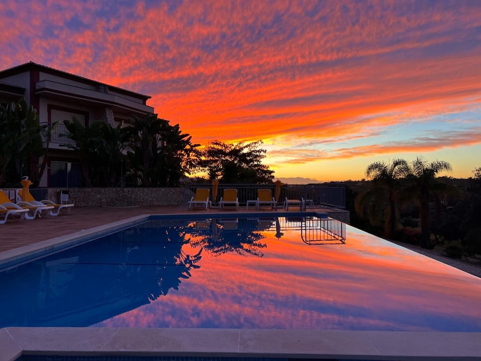 Natural landscape, Pool view, Swimming pool, Sunset, sunbed