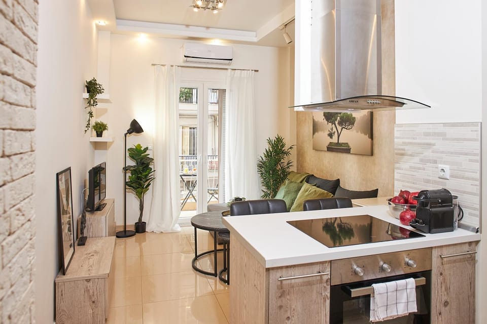 Kitchen or kitchenette, Living room, Seating area, Dining area, oven, stove, air conditioner