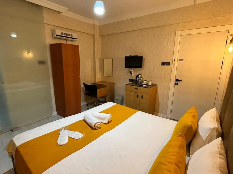 Bed, TV and multimedia, Bedroom, towels, wardrobe, air conditioner