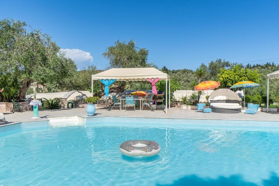 Property building, Living room, Swimming pool