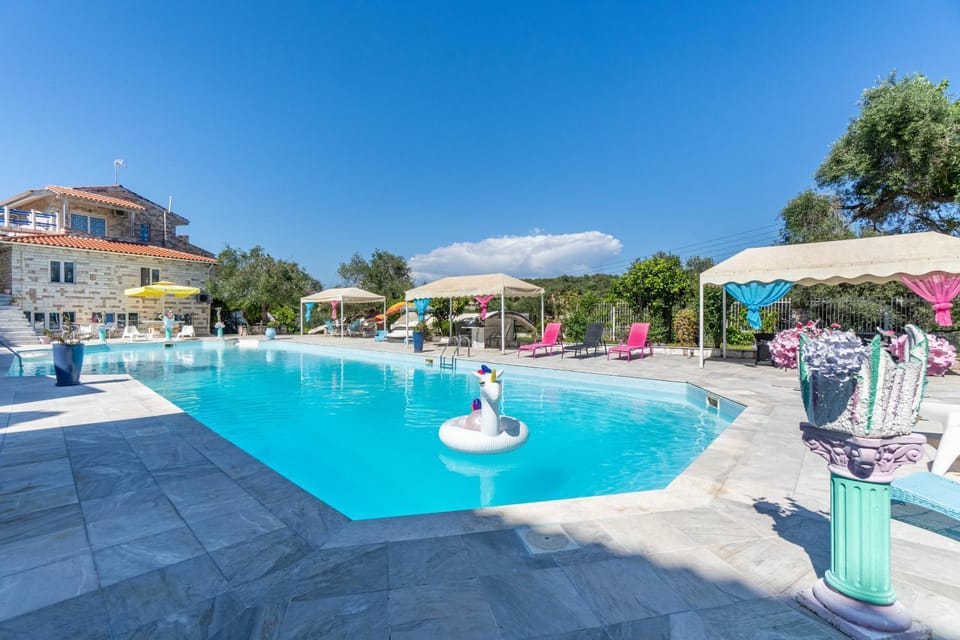 Property building, Living room, Swimming pool
