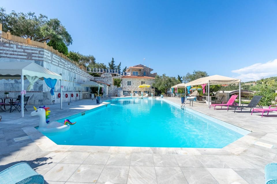 Property building, Living room, Swimming pool