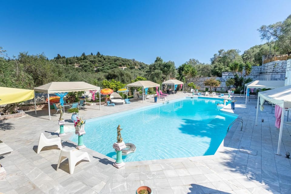 Property building, Living room, Swimming pool