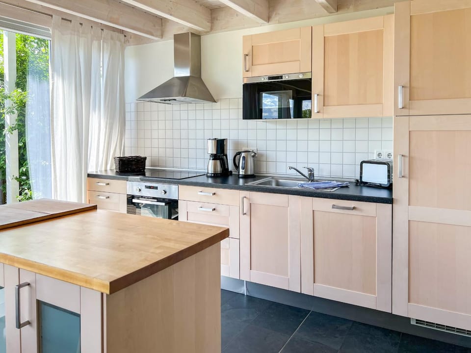 Ferienhaus Wiesengeflüster S1 - mit Sauna, Kamin und Workation an der Müritz House in Röbel