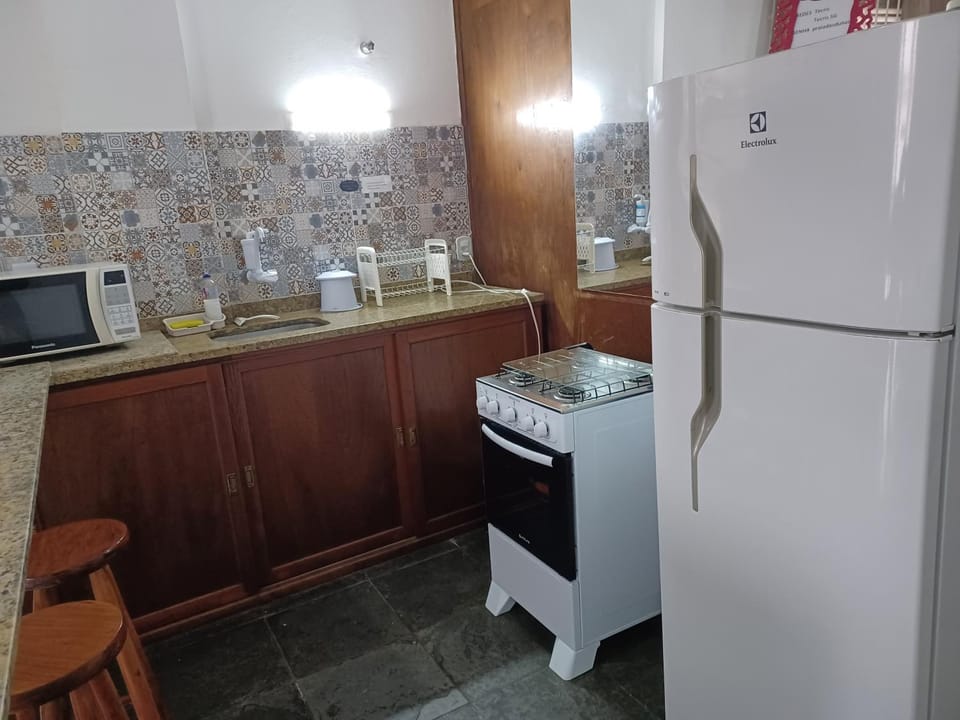 Kitchen or kitchenette, oven, stove