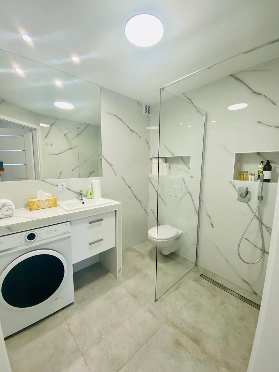 Shower, Toilet, Bathroom, towels, washing machine, dryer