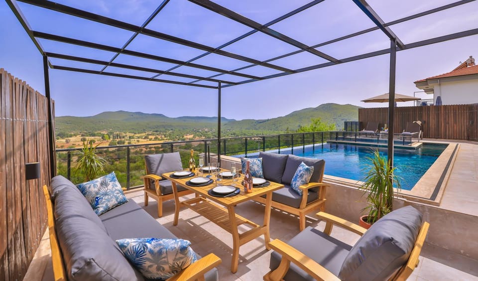 Patio, Seating area, Mountain view, Pool view