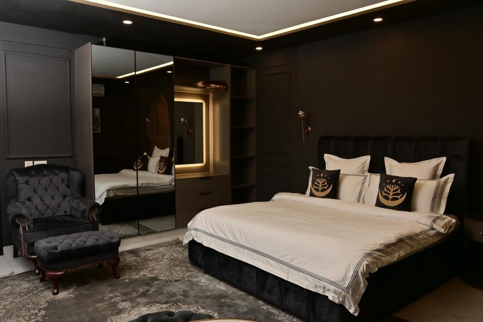 Bed, Living room, Seating area, Bedroom