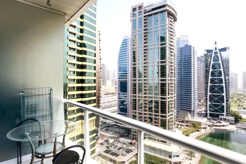 StoneTree - Furnished Studio with Lake View and near Metro Apartment in Dubai