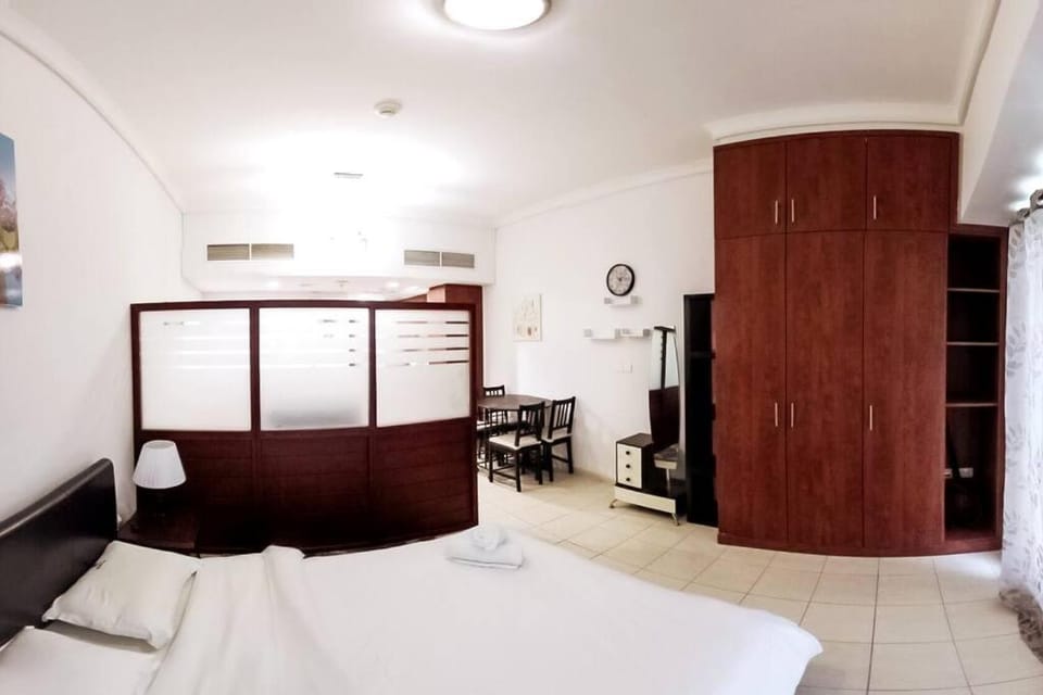 StoneTree - Furnished Studio with Lake View and near Metro Apartment in Dubai