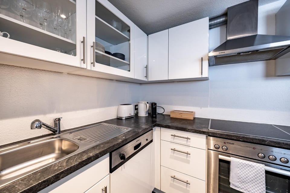Kitchen or kitchenette, stove, toaster