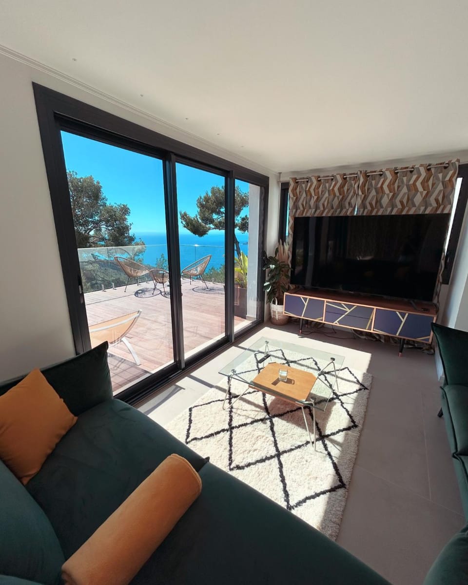 View (from property/room), Living room, Seating area, Sea view