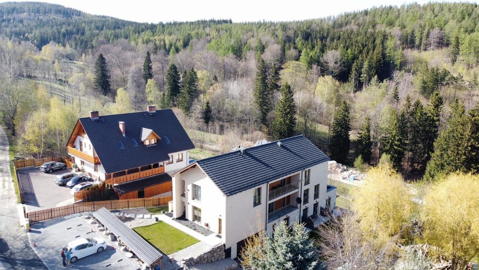 Property building, Natural landscape, Bird's eye view, Mountain view, Parking