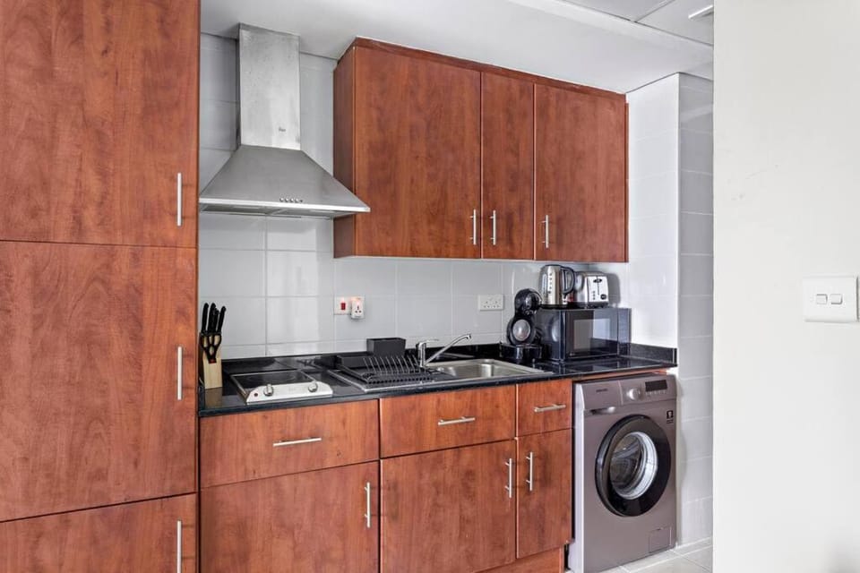 Kitchen or kitchenette, washing machine