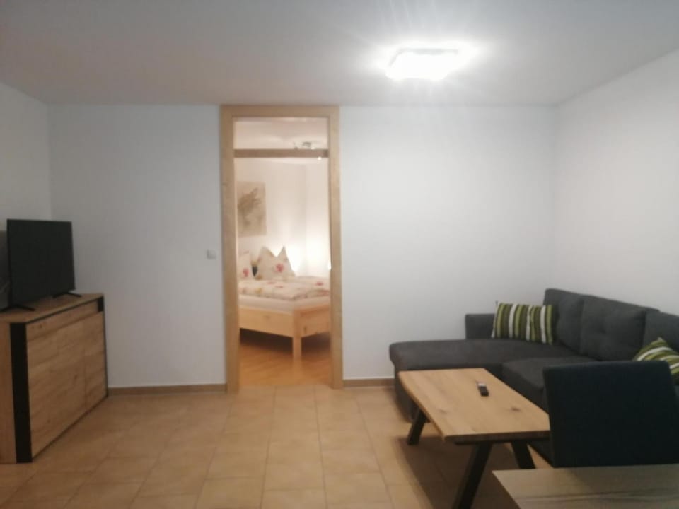 Bed, TV and multimedia, Living room, Photo of the whole room, Seating area, Bedroom