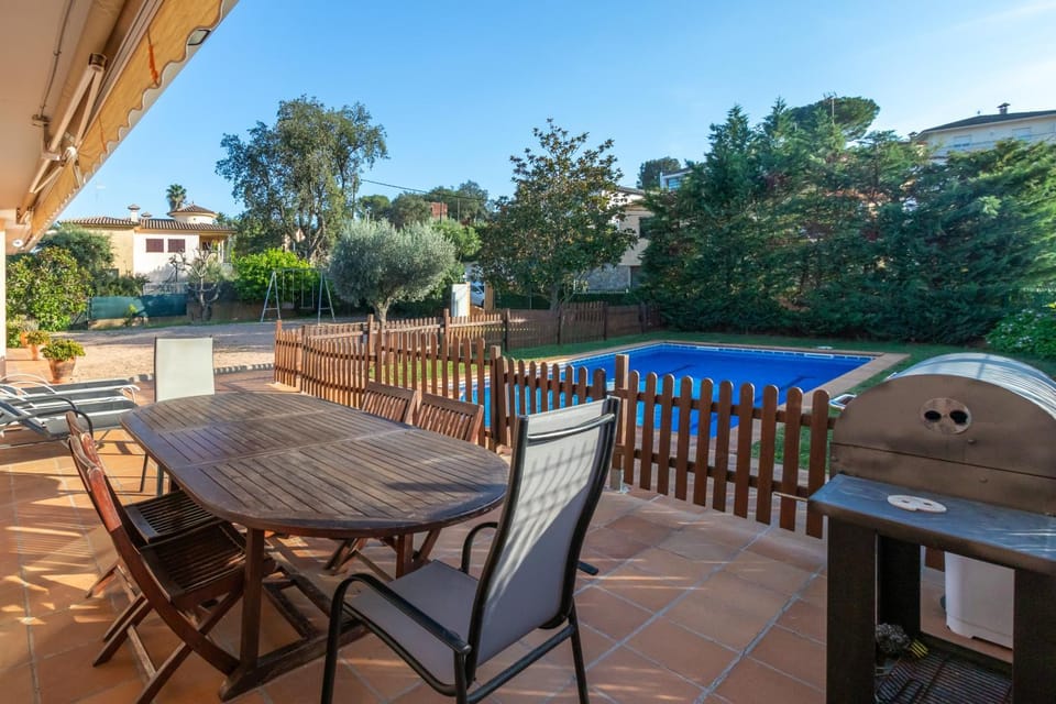 Property building, Living room, Swimming pool