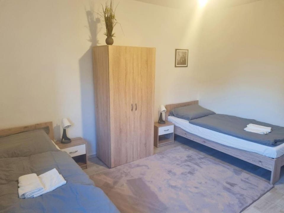 Bed, Photo of the whole room, Bedroom, towels, wardrobe