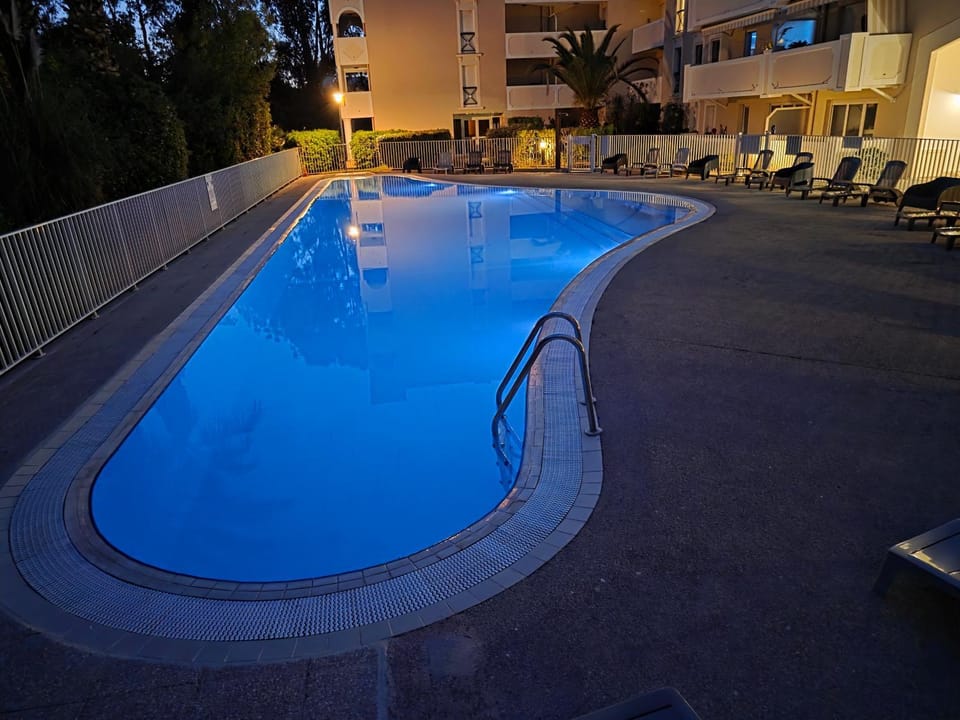 Night, Pool view, Swimming pool, sunbed