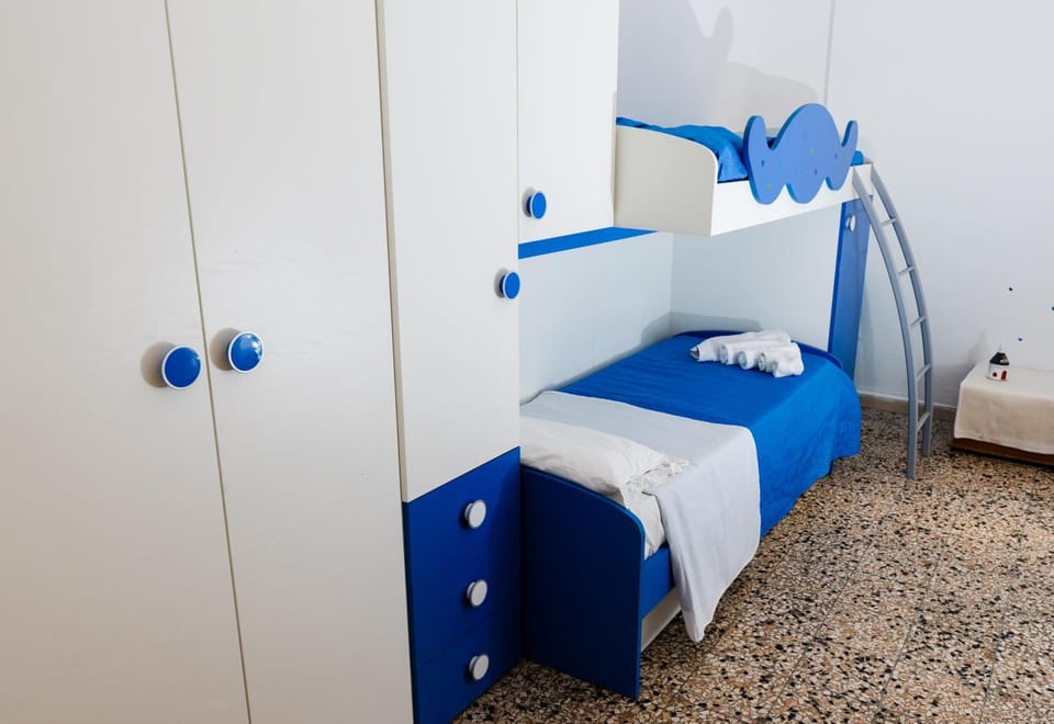 Bed, Photo of the whole room, Bedroom, bunk bed, towels, wardrobe