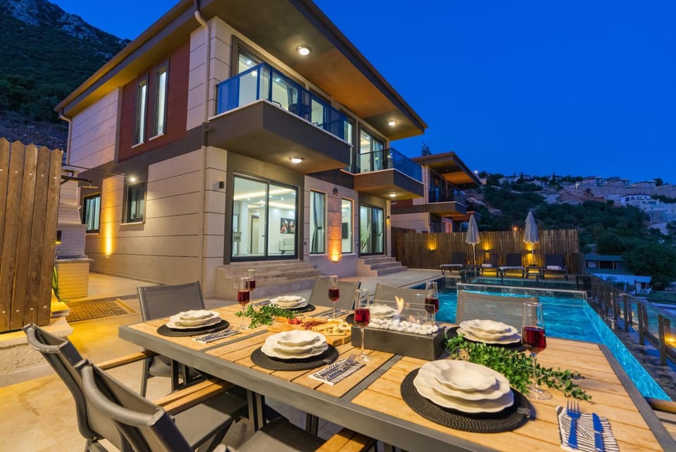 Property building, Patio, Night, Swimming pool, sunbed