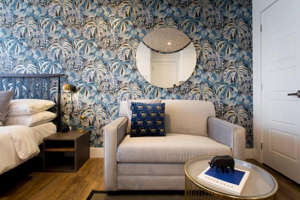 Bed, Living room, Seating area, Bedroom