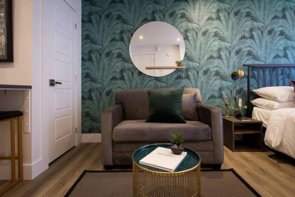 Bed, Living room, Seating area, Bedroom