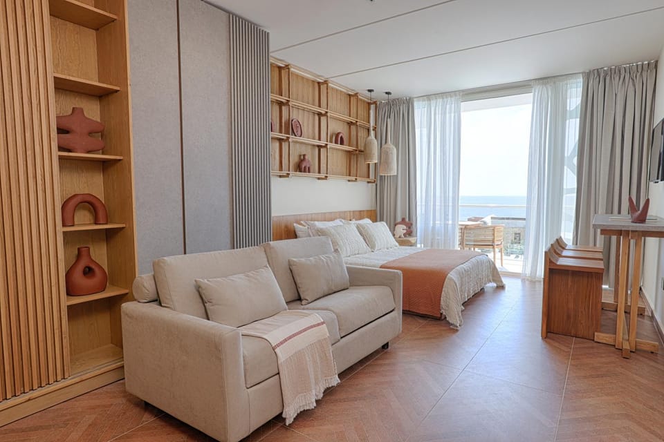Living room, Seating area, Pool view, Sea view