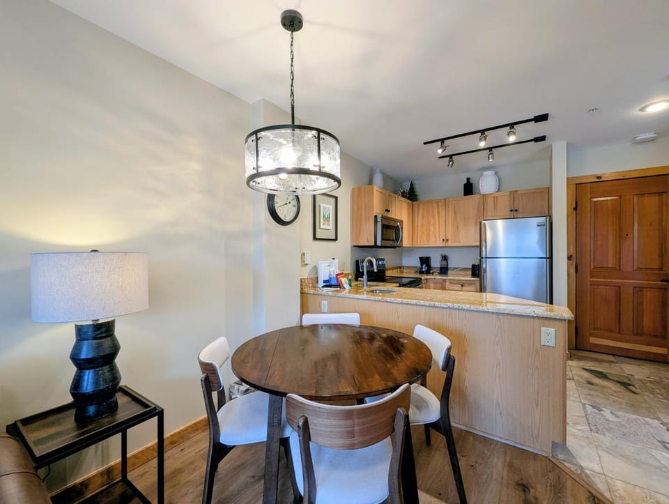 Kitchen or kitchenette, Dining area, furniture, microwave, stove