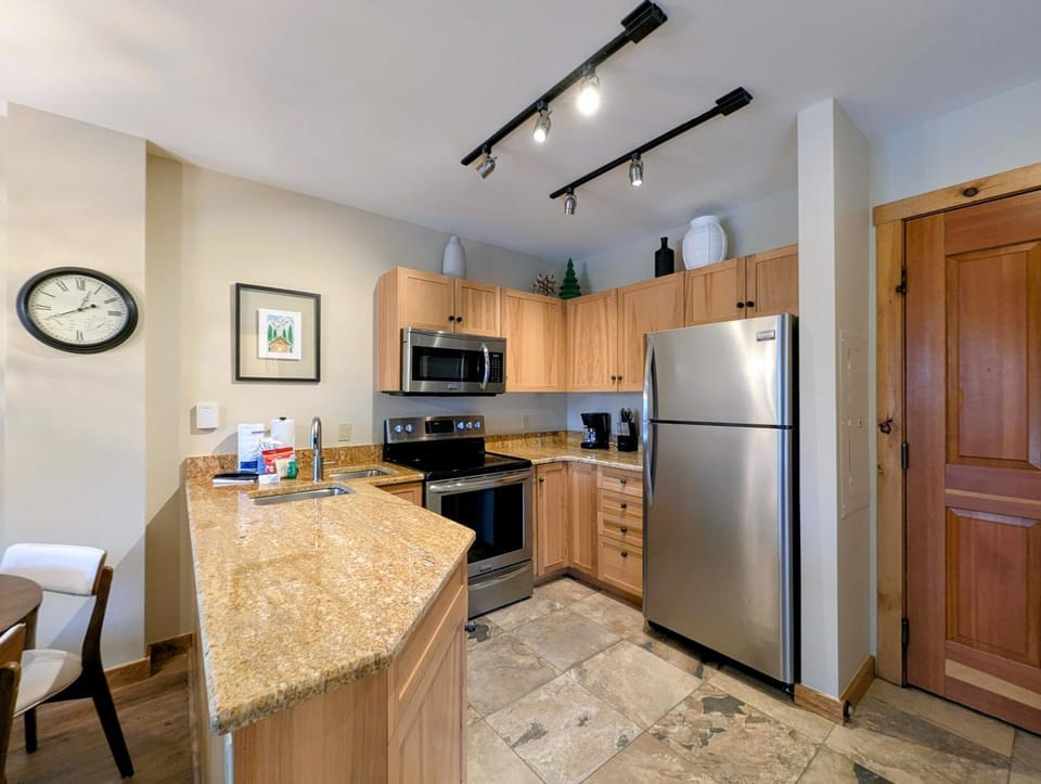 Kitchen or kitchenette, furniture, microwave, oven, stove