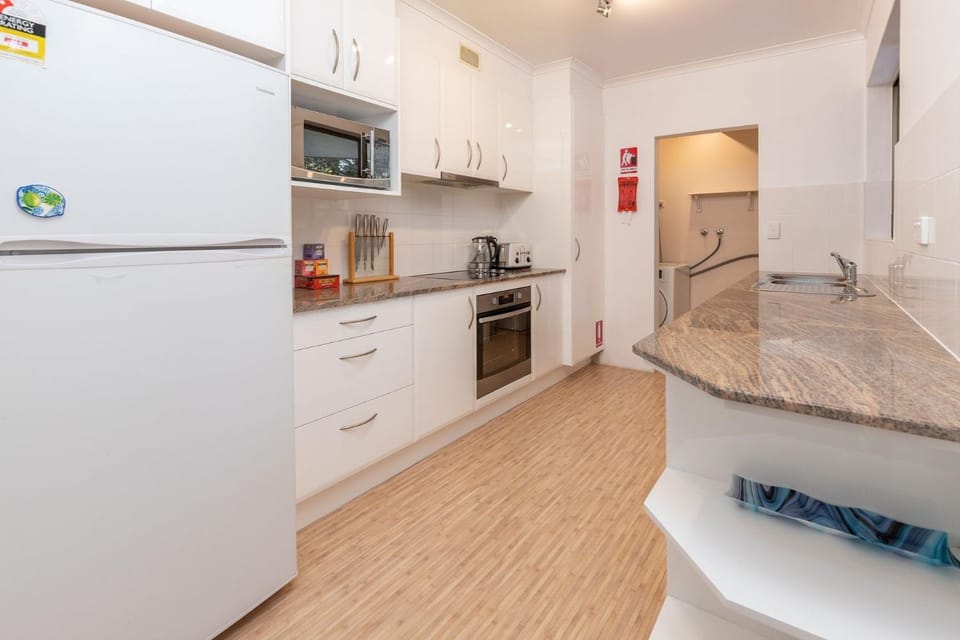 Kitchen or kitchenette, oven, stove